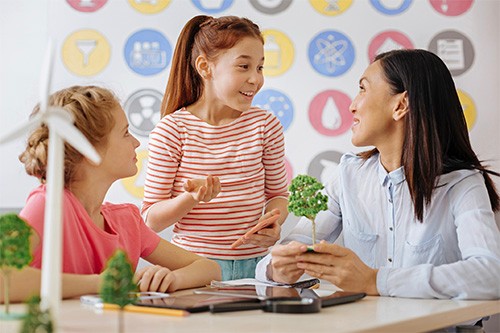 Energy Curriculum teacher and 2 girls