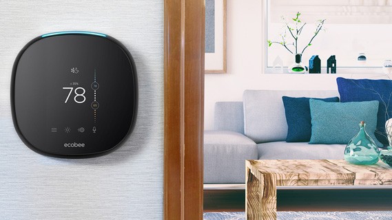 Smart thermostat on a wall