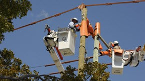 utility lineworker repairing a line